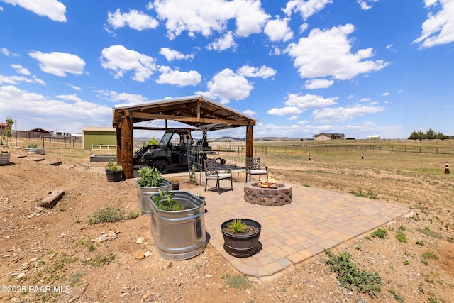 26455 N Bull Snake Rd, Paulden, AZ 86314 - view of yard featuring an outdoor fire pit, a gazebo, a patio area, and a view of countryside