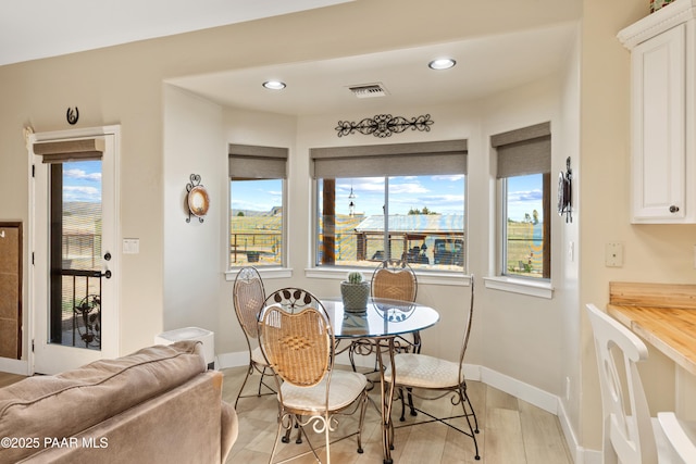 26455 N Bull Snake Rd, Paulden, AZ 86314 - dining space featuring healthy amount of natural light, recessed lighting, and light wood-type flooring