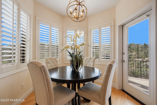 1671 W Catim Way, Prescott, AZ 86305 - dining space with a chandelier, light wood-style flooring, and plenty of natural light