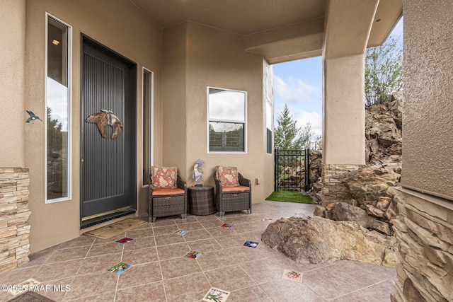 1671 W Catim Way, Prescott, AZ 86305 - property entrance featuring a patio and stucco siding