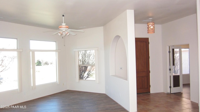 unfurnished room featuring ceiling fan