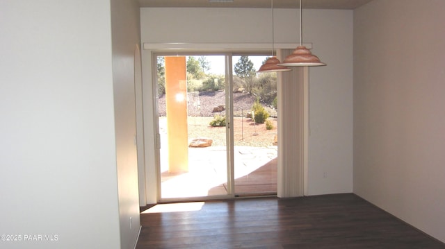 entryway with dark hardwood / wood-style floors