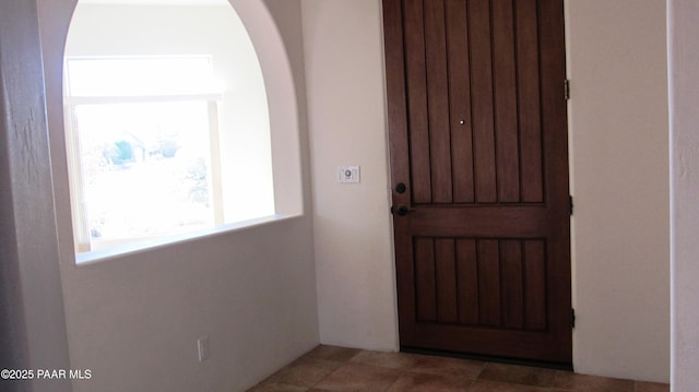 foyer with tile patterned flooring