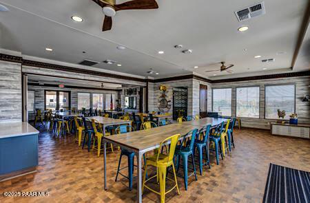5570 N Pierce Ln, Prescott Valley, AZ 86314 - dining space with ceiling fan, ornamental molding, and recessed lighting