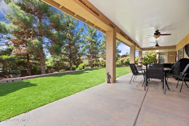5570 N Pierce Ln, Prescott Valley, AZ 86314 - view of patio / terrace with outdoor dining space and ceiling fan