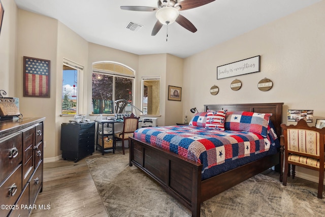 5570 N Pierce Ln, Prescott Valley, AZ 86314 - bedroom featuring wood finished floors, baseboards, and a ceiling fan