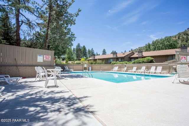 1141 Deerfield Rd, Prescott, AZ 86303 - community pool featuring fence and a patio area