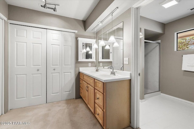 1141 Deerfield Rd, Prescott, AZ 86303 - full bathroom with a shower stall, double vanity, and a closet