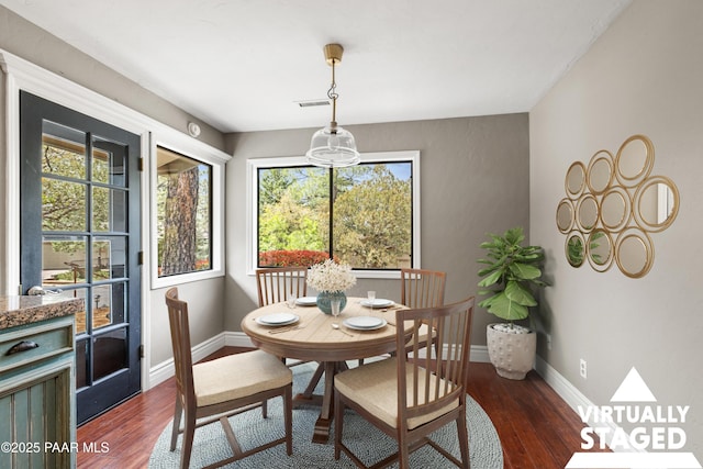 1141 Deerfield Rd, Prescott, AZ 86303 - dining space with plenty of natural light, dark wood finished floors, and baseboards