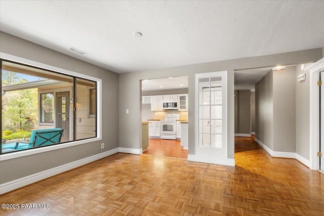 1141 Deerfield Rd, Prescott, AZ 86303 - unfurnished living room featuring baseboards