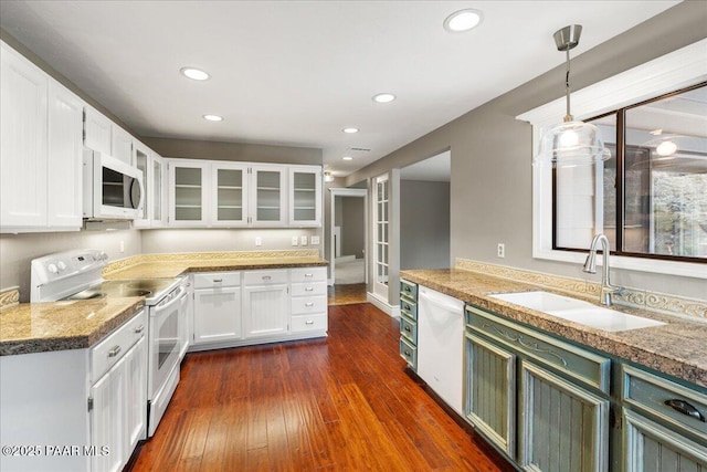 1141 Deerfield Rd, Prescott, AZ 86303 - kitchen featuring white appliances, a sink, white cabinets, glass insert cabinets, and recessed lighting