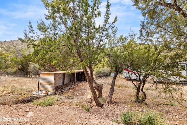 exterior space featuring an outbuilding