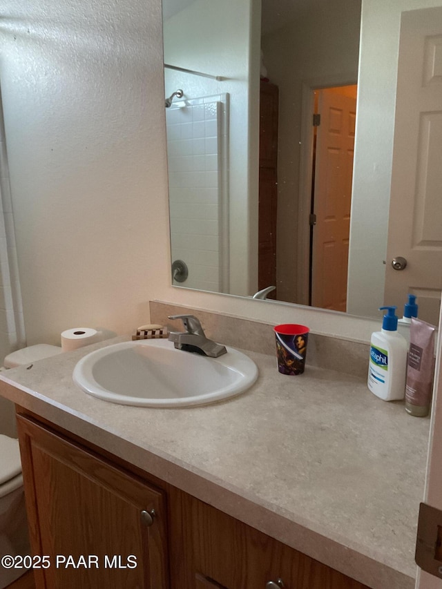54683 N El Portal Ln, Seligman, AZ 86337 - bathroom with vanity and toilet