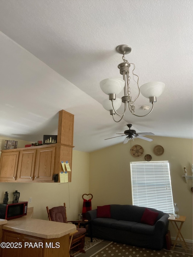 54683 N El Portal Ln, Seligman, AZ 86337 - living room with ceiling fan and vaulted ceiling