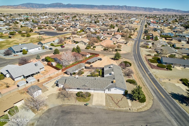 bird's eye view with a mountain view and a residential view