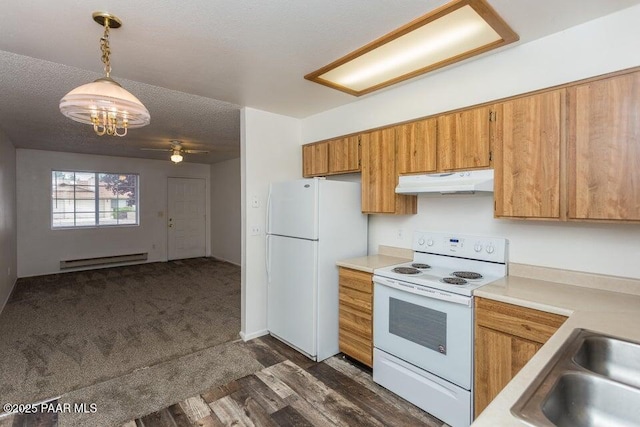 kitchen with under cabinet range hood, a textured ceiling, white appliances, light countertops, and a baseboard radiator