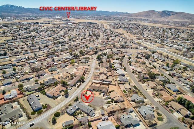 drone / aerial view with a mountain view and a residential view