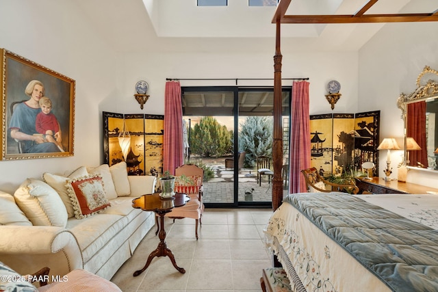 bedroom with access to outside and tile patterned floors