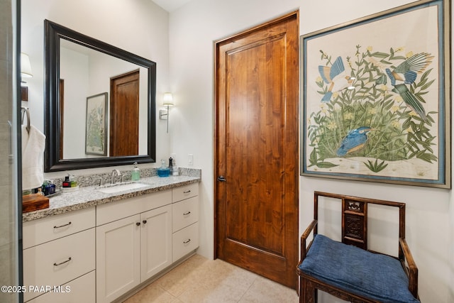 bathroom with vanity and tile patterned floors