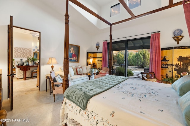 bedroom featuring access to outside, high vaulted ceiling, and tile patterned floors