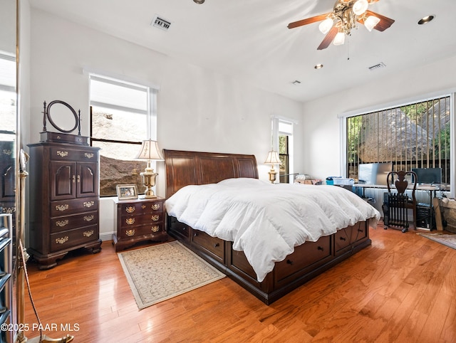 22891 S Lakewood Dr, Yarnell, AZ 85362 - bedroom with recessed lighting, a ceiling fan, visible vents, and light wood-type flooring