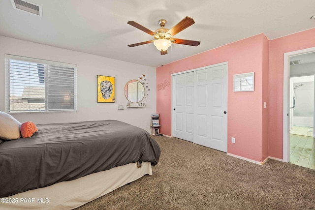 bedroom featuring ceiling fan, carpet flooring, a closet, and visible vents