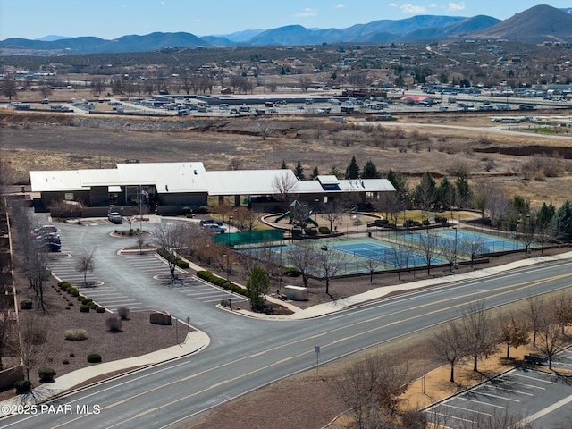 drone / aerial view featuring a mountain view
