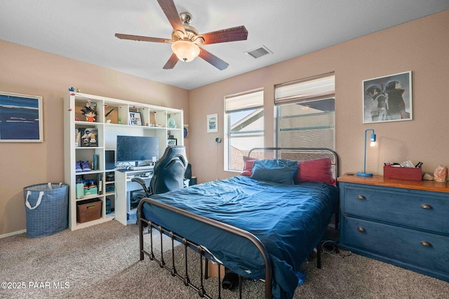 bedroom featuring visible vents, baseboards, ceiling fan, and carpet floors