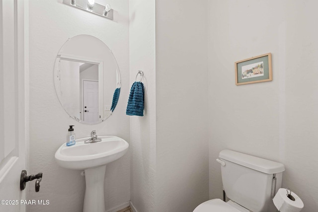 bathroom featuring toilet