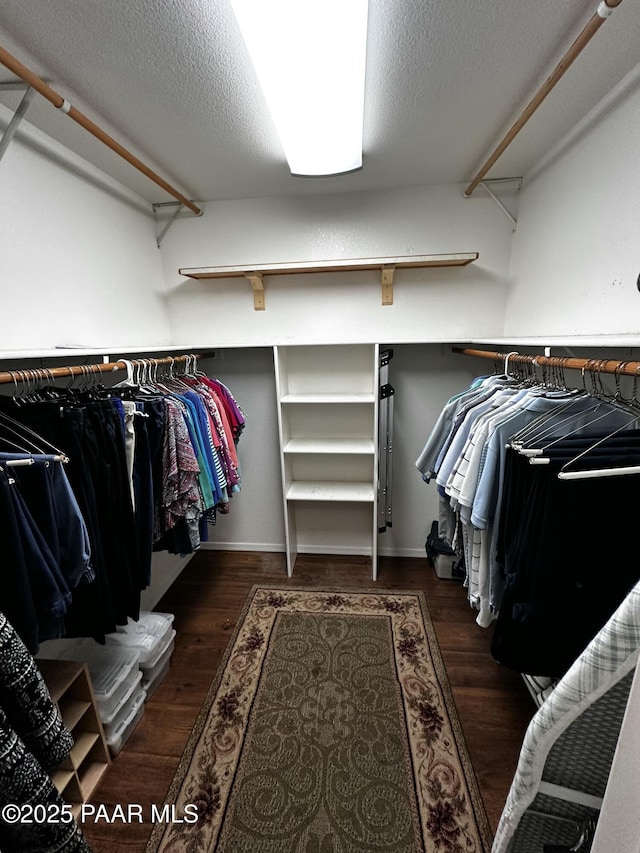 4433 N La Jolla Cir, Prescott Valley, AZ 86314 - spacious closet featuring wood finished floors