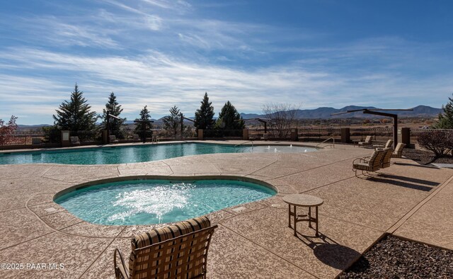 12933 Ponce St, Dewey-Humboldt, AZ 86327 - community pool with a hot tub, a patio area, and a mountain view
