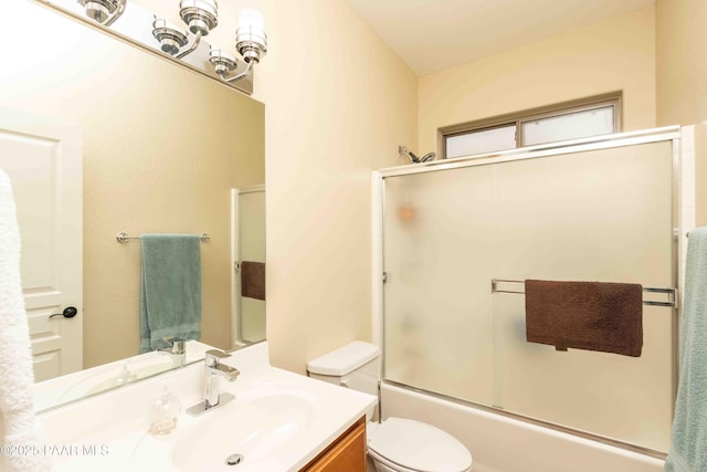 12933 Ponce St, Dewey-Humboldt, AZ 86327 - bathroom featuring vanity and bath / shower combo with glass door