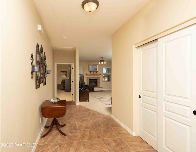 12933 Ponce St, Dewey-Humboldt, AZ 86327 - hallway featuring baseboards and light tile patterned flooring