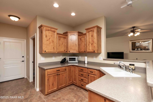 12933 Ponce St, Dewey-Humboldt, AZ 86327 - kitchen with ceiling fan, a peninsula, light tile patterned floors, and recessed lighting