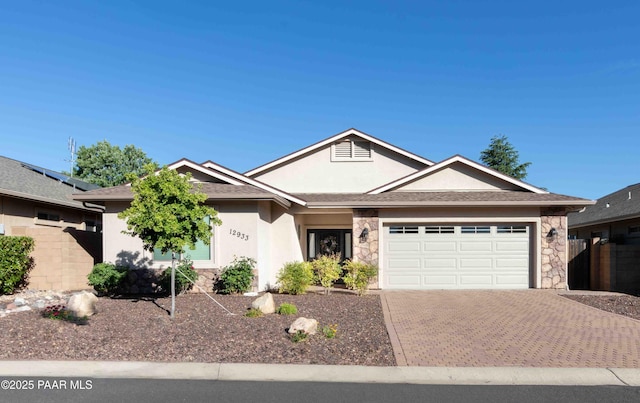 12933 Ponce St, Dewey-Humboldt, AZ 86327 - ranch-style house with a garage, stone siding, decorative driveway, and stucco siding