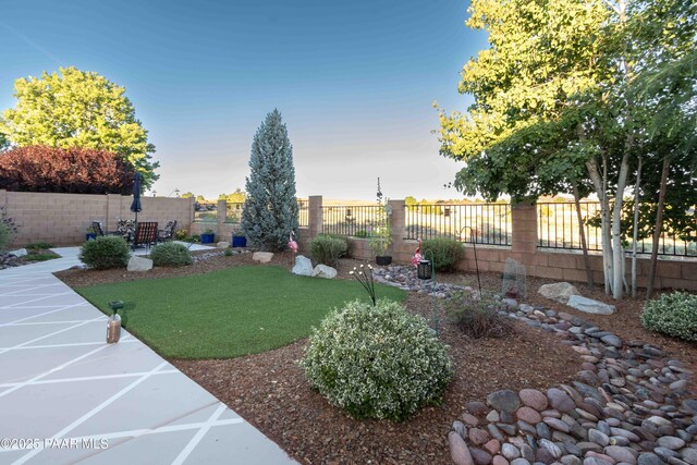 12933 Ponce St, Dewey-Humboldt, AZ 86327 - fenced backyard with a patio