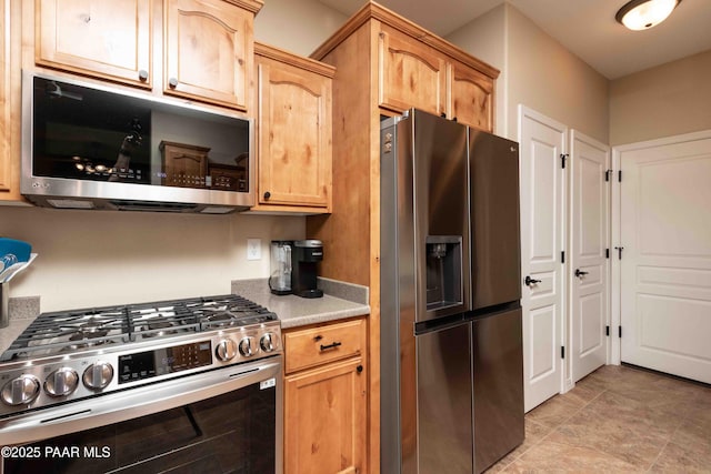 12933 Ponce St, Dewey-Humboldt, AZ 86327 - kitchen with appliances with stainless steel finishes and light countertops