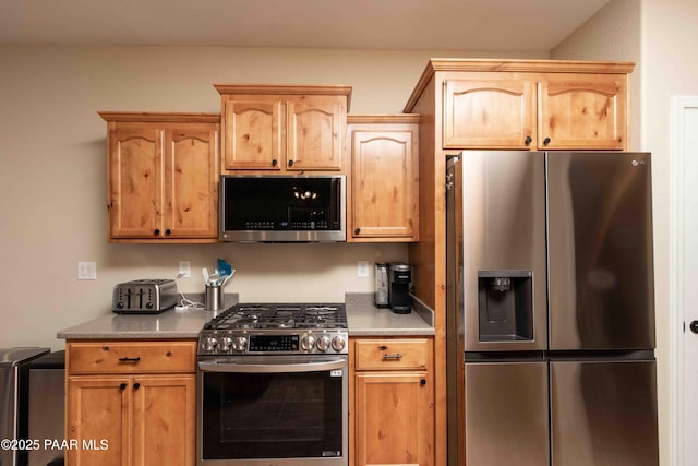 12933 Ponce St, Dewey-Humboldt, AZ 86327 - kitchen featuring appliances with stainless steel finishes, light brown cabinetry, and light countertops