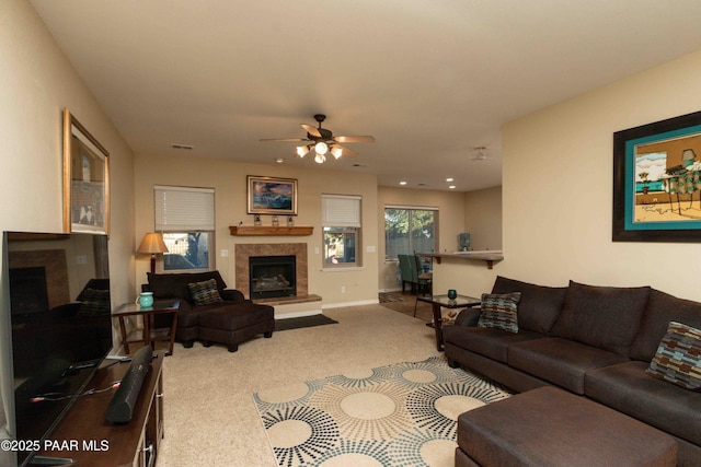 12933 Ponce St, Dewey-Humboldt, AZ 86327 - living room with a glass covered fireplace, carpet floors, ceiling fan, and recessed lighting