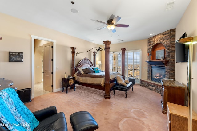 1591 Northridge Dr, Prescott, AZ 86301 - bedroom with ceiling fan, light colored carpet, and a stone fireplace