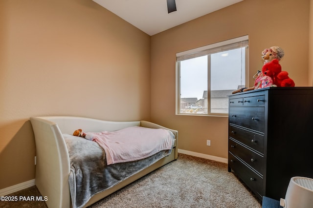 bedroom featuring ceiling fan, carpet, and baseboards