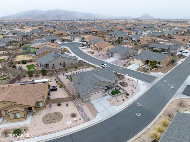 birds eye view of property featuring a residential view and a mountain view