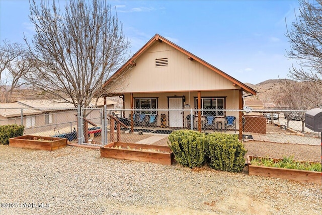 view of front of house with a mountain view