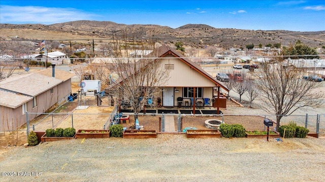 view of front facade featuring a mountain view