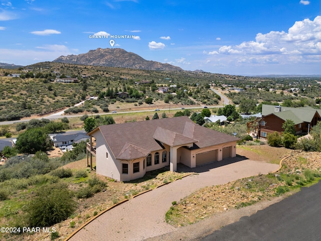 drone / aerial view featuring a mountain view