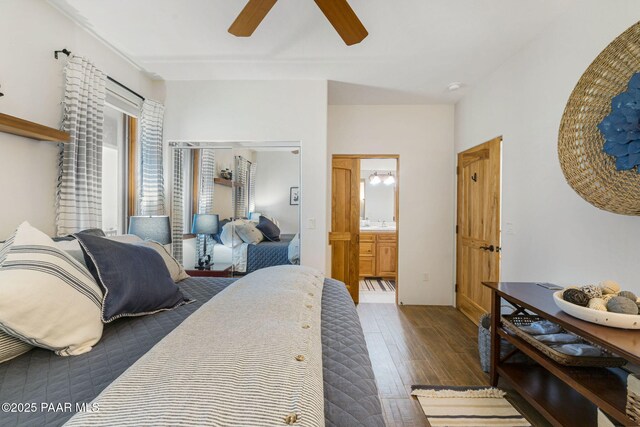 bedroom featuring hardwood / wood-style flooring and ceiling fan