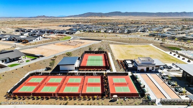 aerial perspective of suburban area with mountains