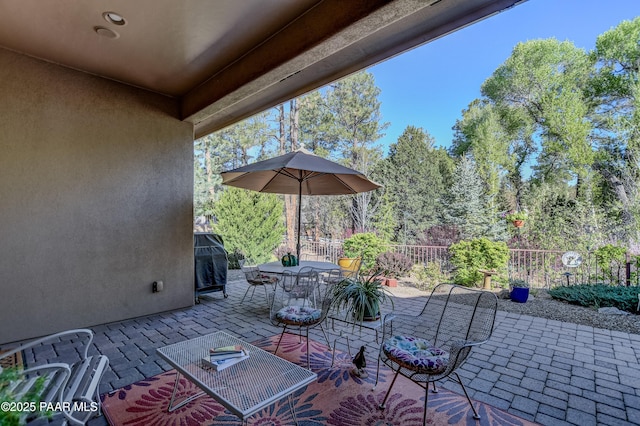 1690 Stable Rock Rd, Prescott, AZ 86303 - view of patio with fence, outdoor dining space, and area for grilling