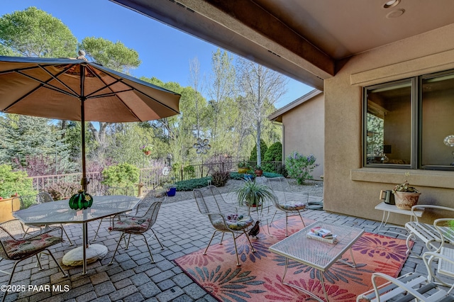 1690 Stable Rock Rd, Prescott, AZ 86303 - view of patio featuring outdoor dining area and a fenced backyard