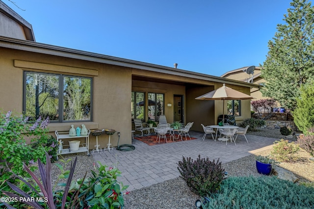 1690 Stable Rock Rd, Prescott, AZ 86303 - rear view of house featuring stucco siding and a patio area
